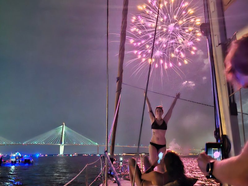 a group of people on a boat in the water