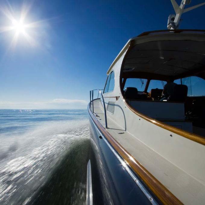 a boat racing through the ocean