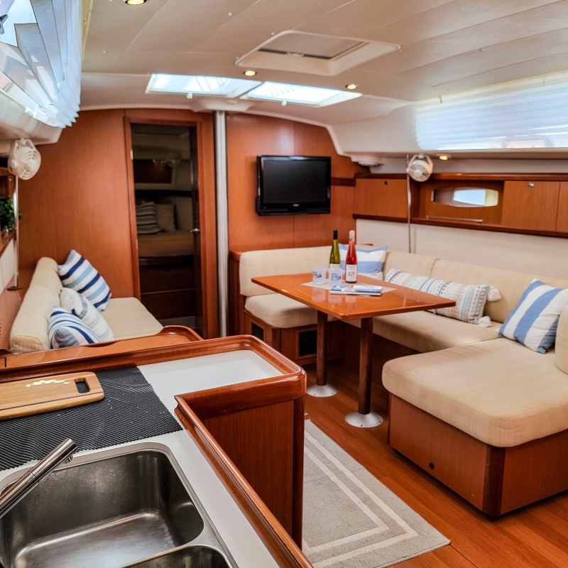 a bedroom with a desk and chair in a room