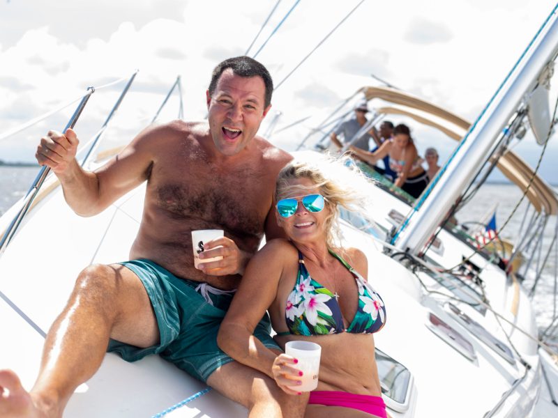 a man and a woman sitting on a boat