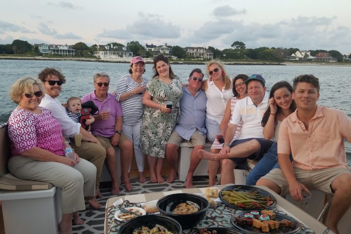a group of people sitting posing for the camera