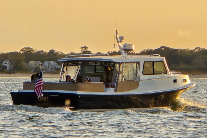 a small boat in a large body of water