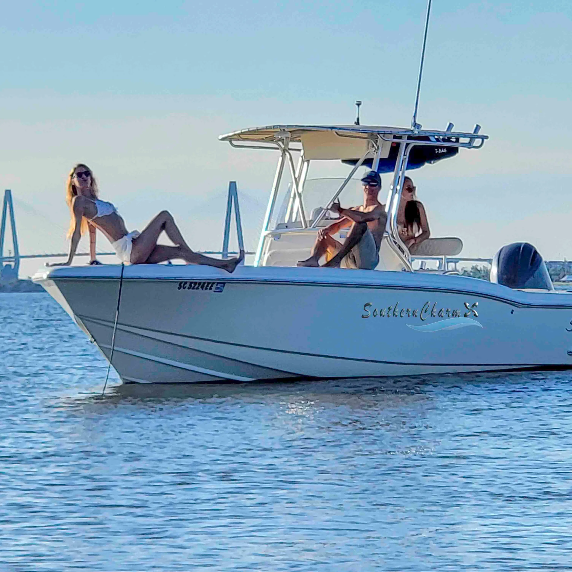a group of people on a boat in the water