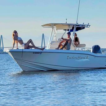 a group of people on a boat in the water