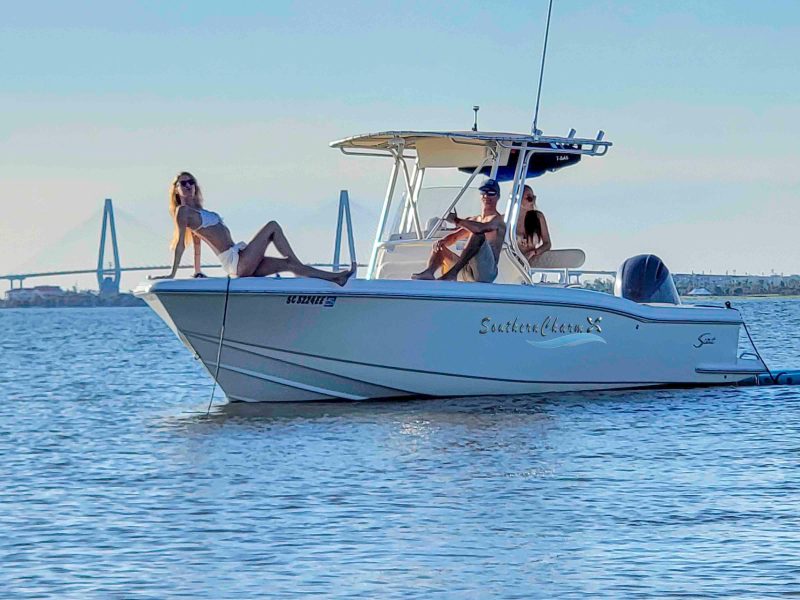 a group of people on a boat in the water