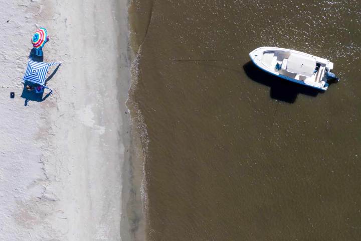 a man flying through the air while riding skis