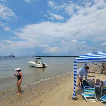 a group of people on a beach